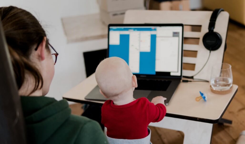 How to Work From Home Productively with Children (Image of Baby with Computer)